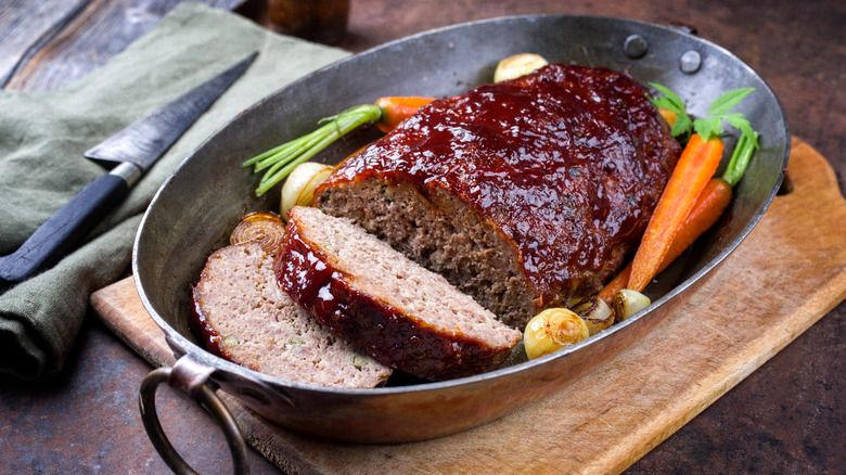 meatloaf with carrots and copper saucepan 