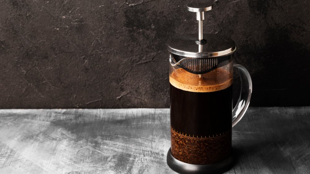 French press with coffee inside 