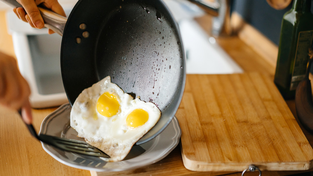 Fried eggs on stove