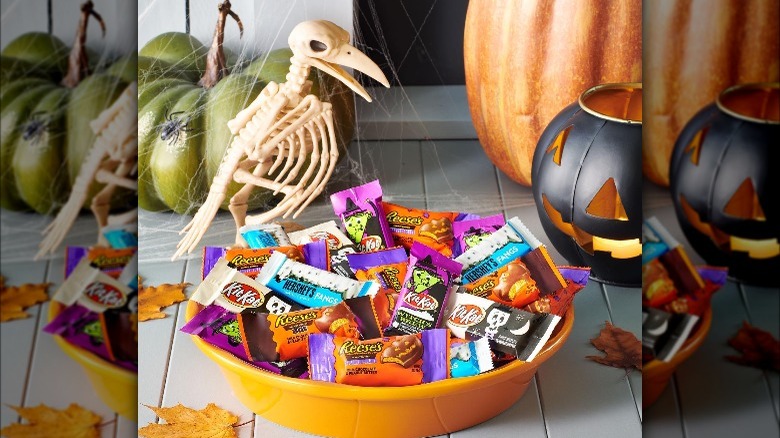 Bowl full of Halloween candy with decor