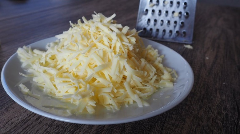 shredded cheese on plate