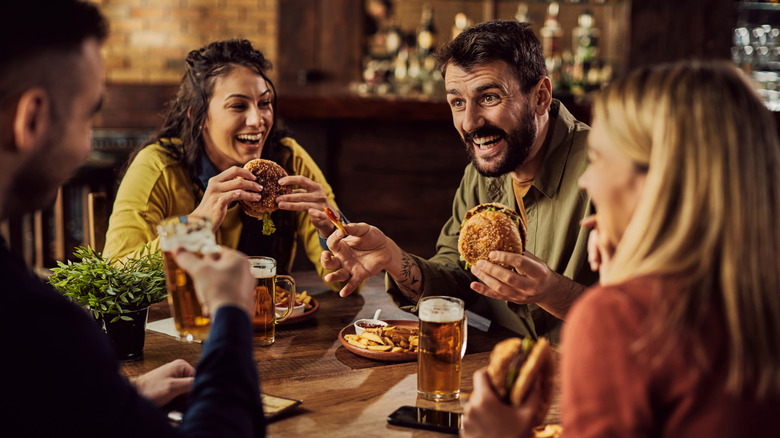 Friends eating at restaurant