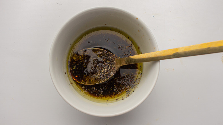 dressing in bowl with spoon