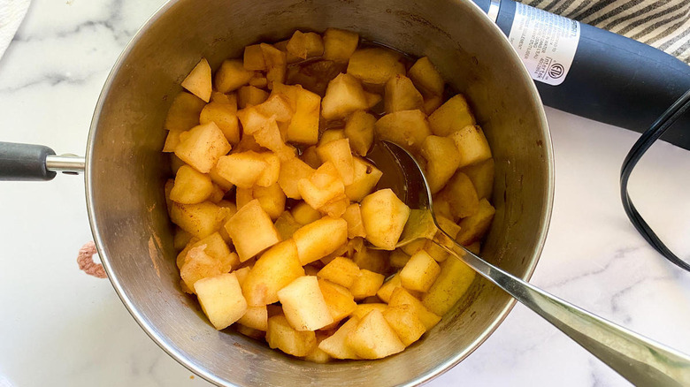 cooked apple chunks in pot