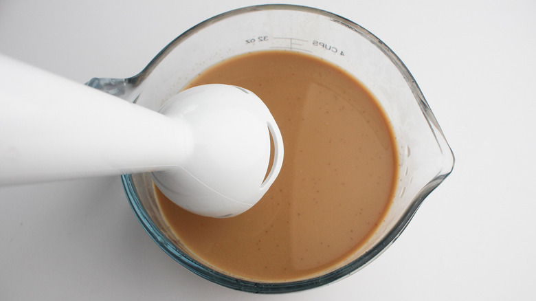 immersion blender above chai latte