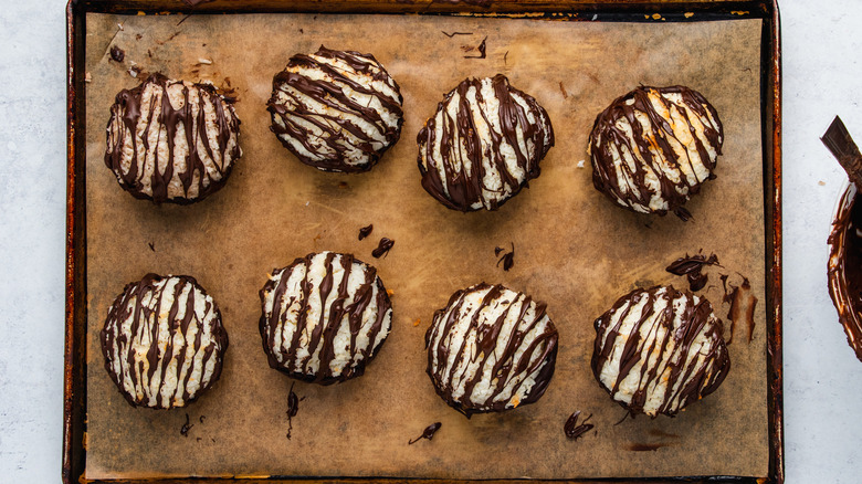 chocolate covered macaroons on tray