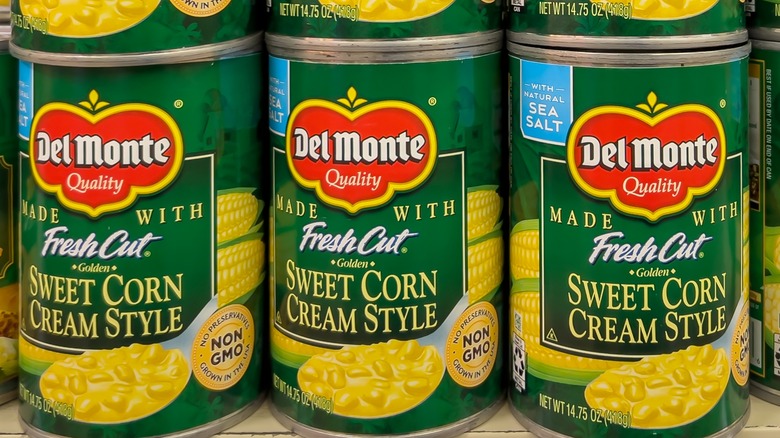 Cans of Del Monte cream-style corn