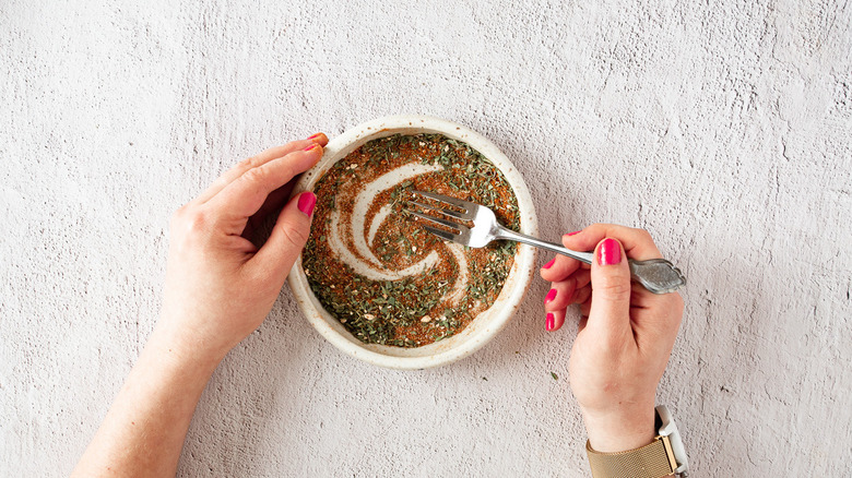 mixing spices in bowl