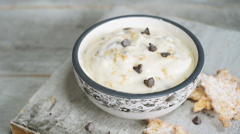 Chocolate chip cheesecake dip in ceramic dish