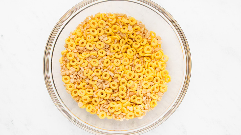 Honey hoops and crisp rice cereal in mixing bowl