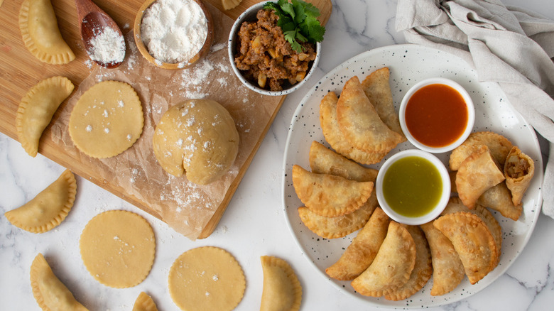 table with cooked empanadas