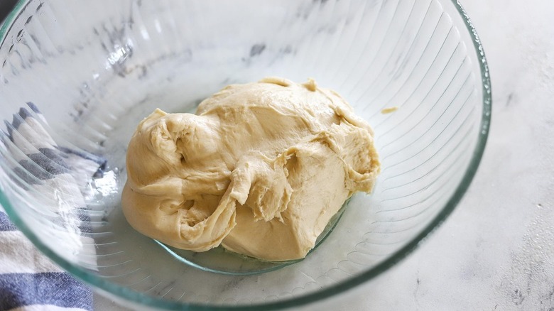 english muffin dough in bowl