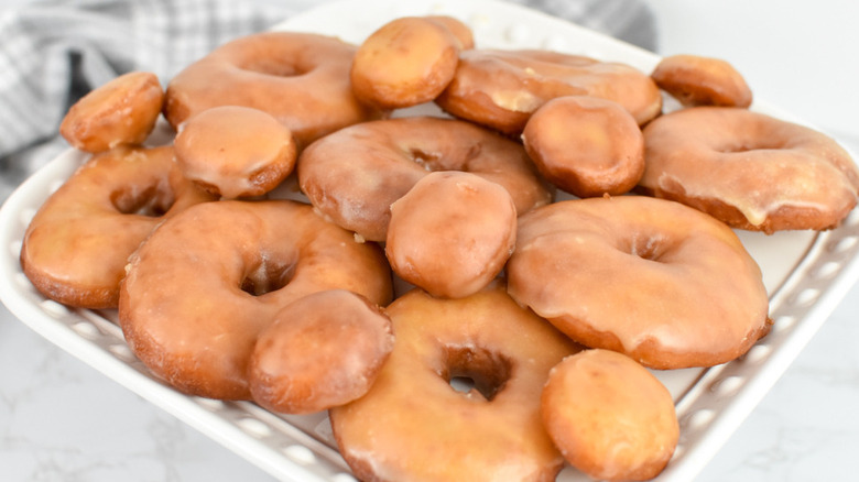 glazed doughnuts on platter