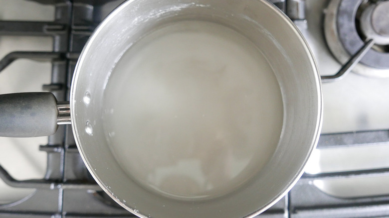 Homemade Lemon Italian Ice ingredients in saucepan