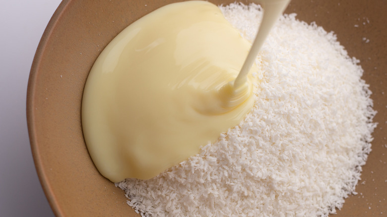 Condensed milk and coconut in a bowl