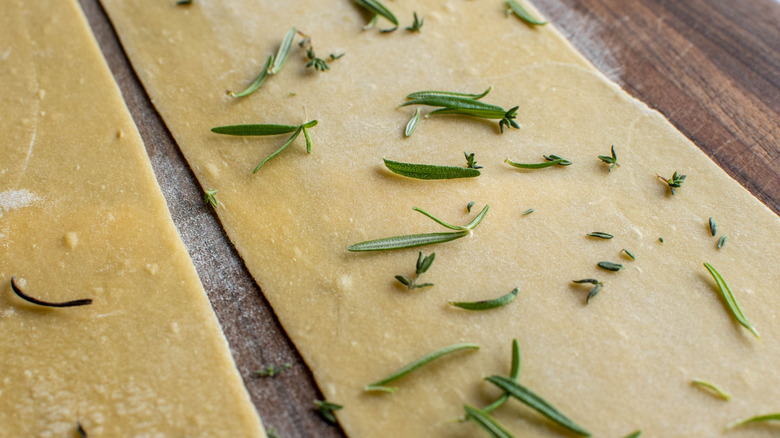 herbs on pasta dough 