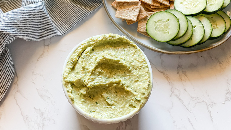 hummus in white ramekin