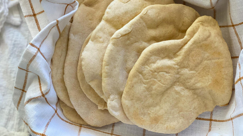 Pita bread sitting in a basket