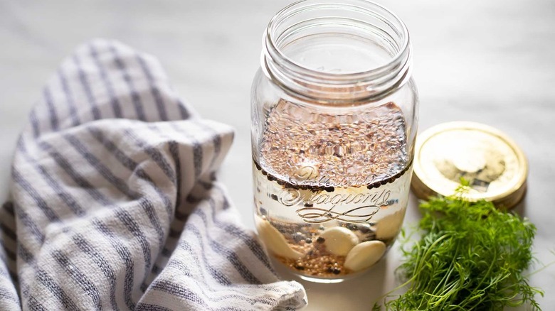 jar with liquid and spices