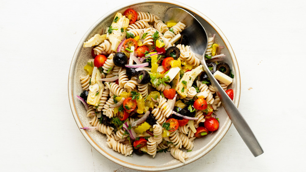 antipasto pasta salad with olives, tomatoes, peppers and artichoke