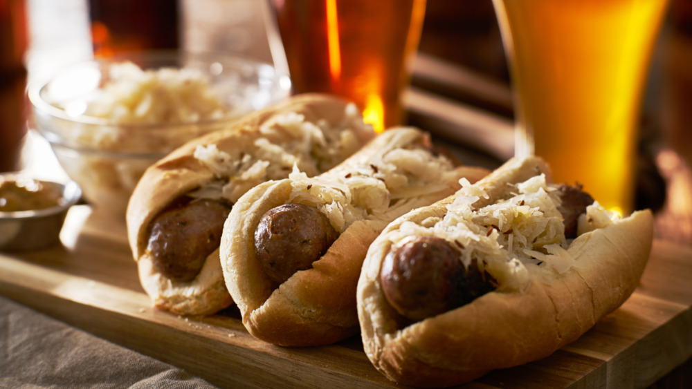 Sauerkraut on sausages and rolls