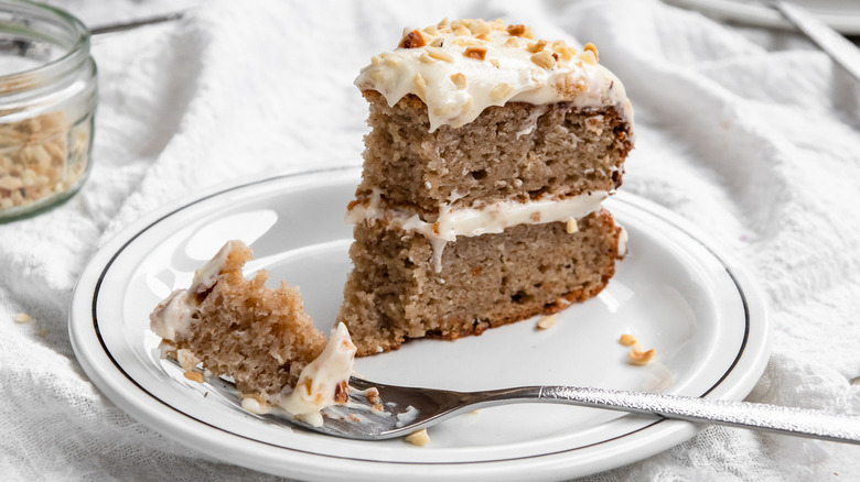 slice of spice cake slathered with cream cheese frosting