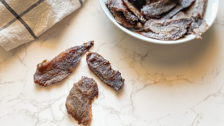 beef jerky pieces on counter