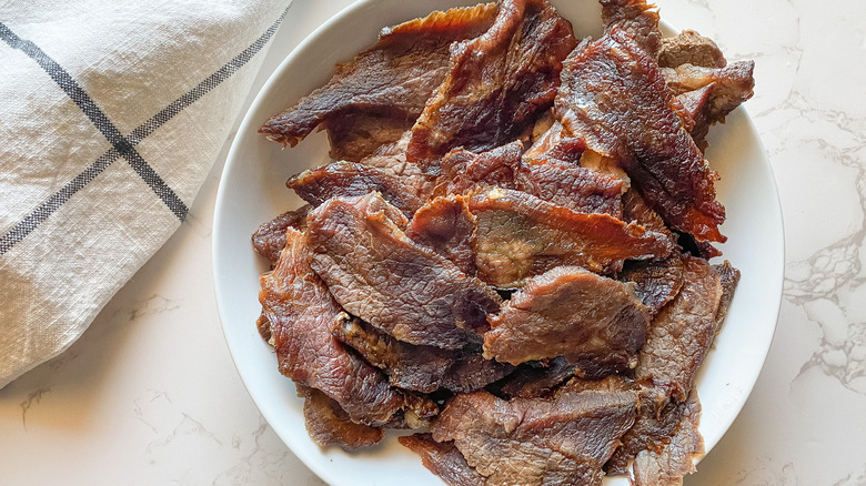 beef jerky strips on plate