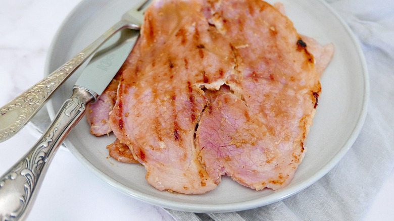 glazed ham steaks on plate