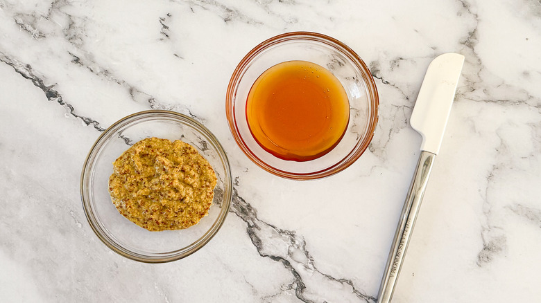 honey and mustard in bowls