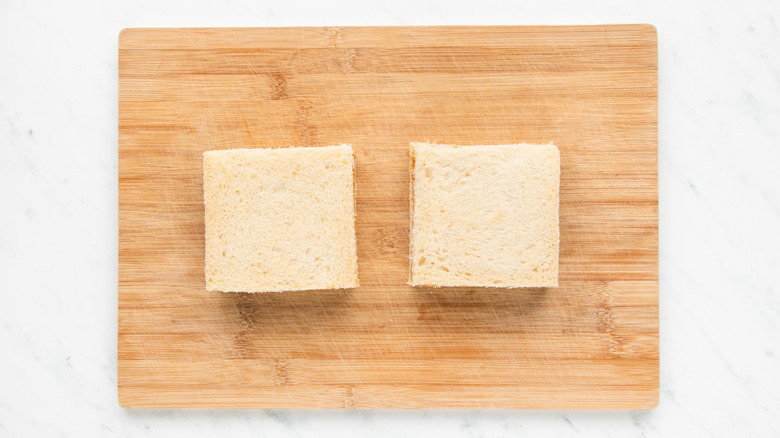 Two milk bread sandwiches with crusts cut off