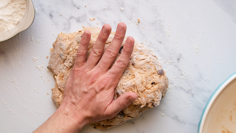 Kneadng the hot cross buns dough