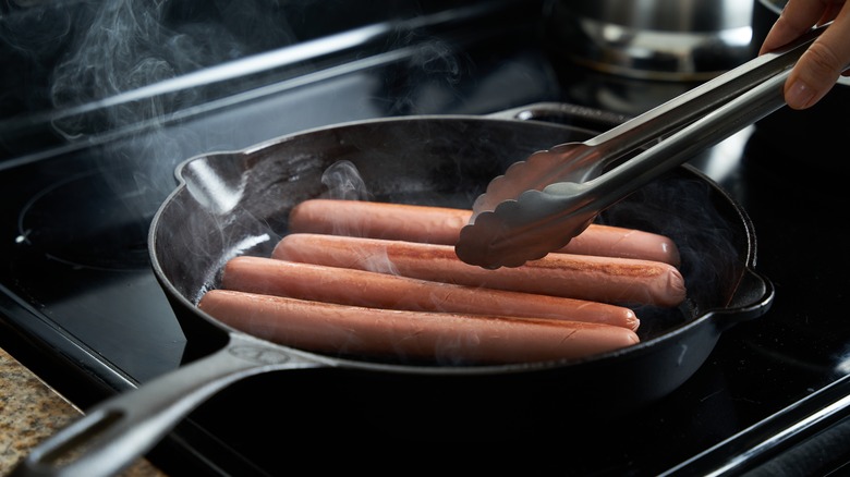 hot dogs in skillet