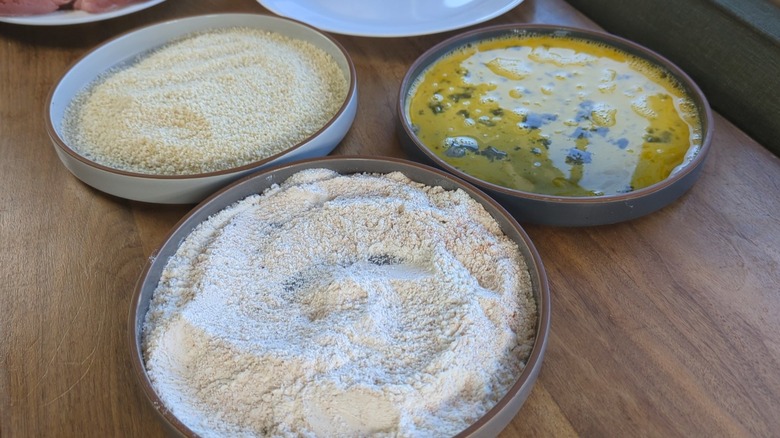 plates of flour, egg, and panko breadcrumbs