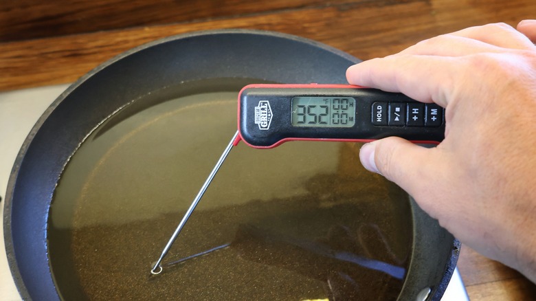 thermometer in skillet of oil