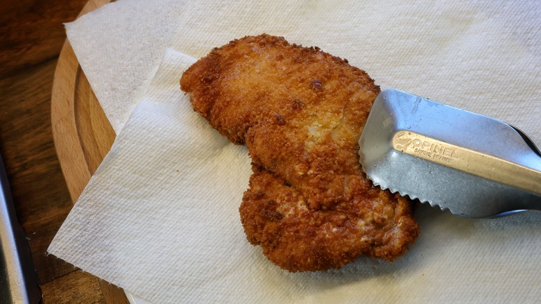 fried pork tenderloin on plate