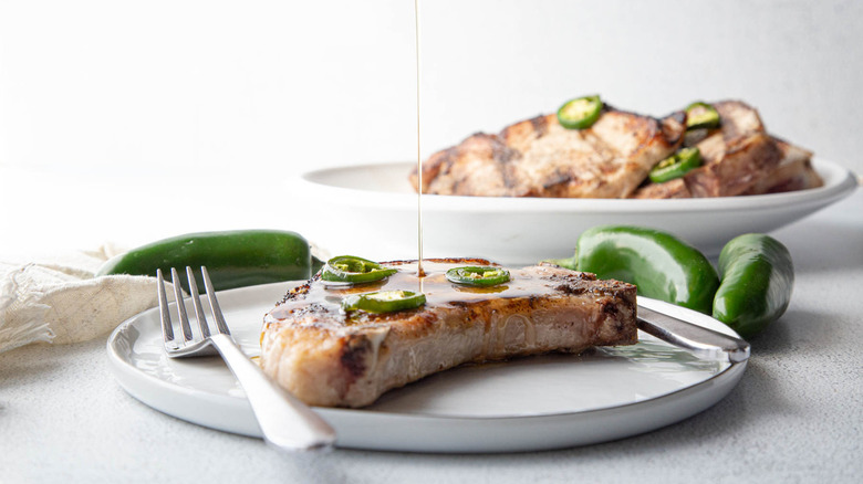 pork chops with sliced jalapeños