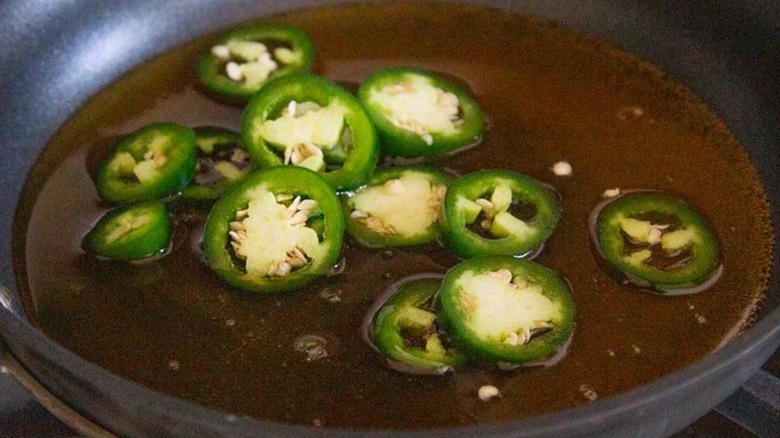 jalapeños in pan with honey