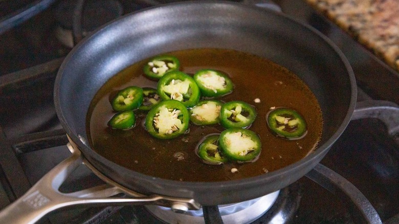 jalapeños in pan with honey