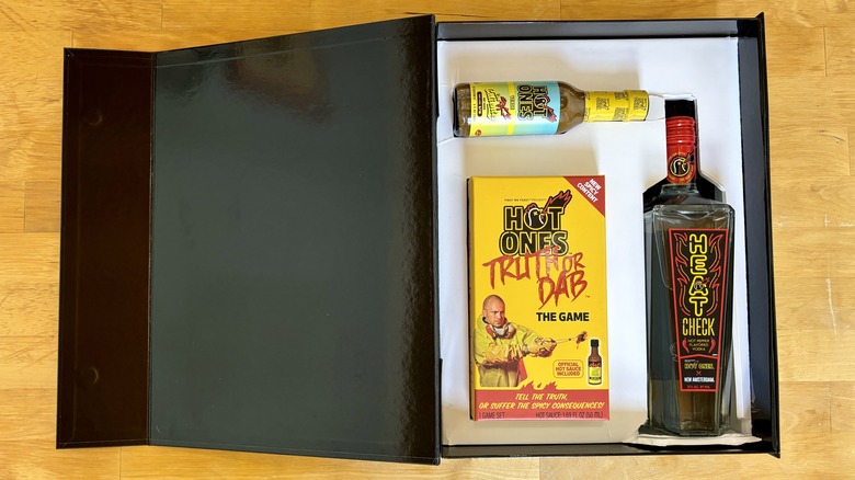 gift box with card game, hot sauce, vodka