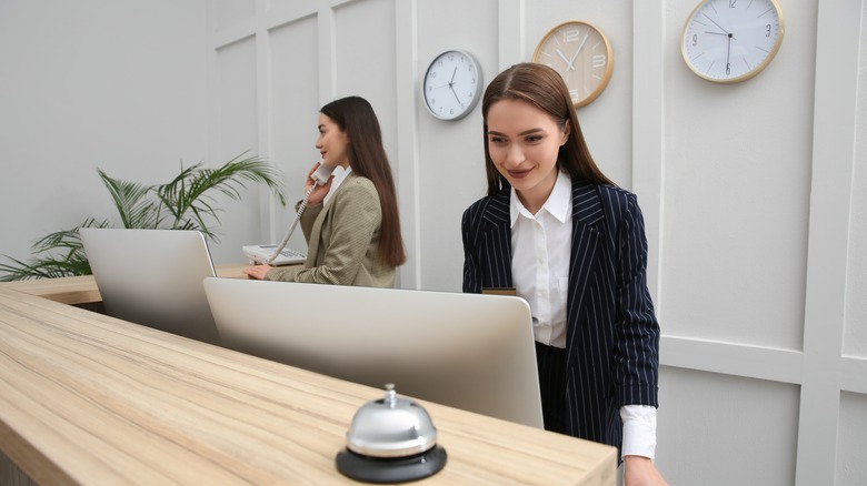 Hotel staff at concierge desk