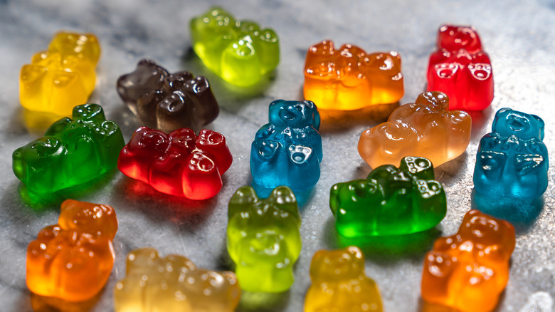 hemp cannabis gummy bears on gray background