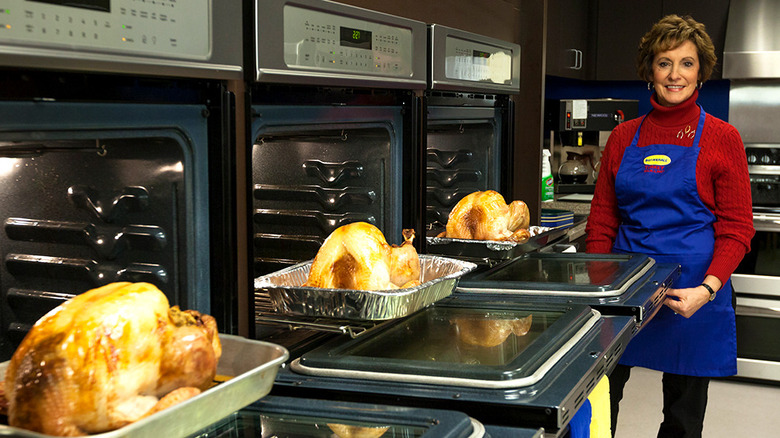 Woman cooking turkeys at Butterball