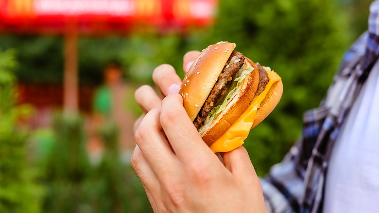 Man eating McDonald's Big Mac