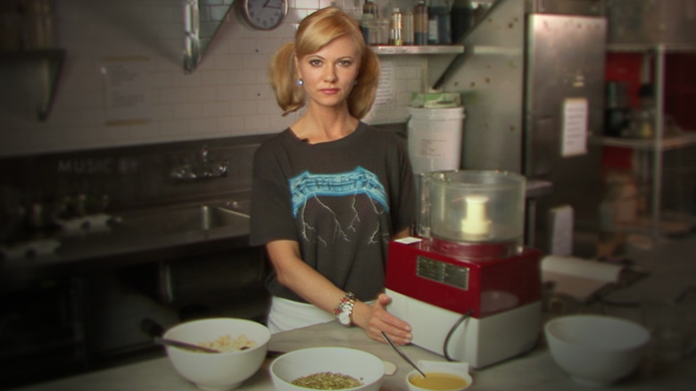 Sarma Melngailis standing in a kitchen with serious expression