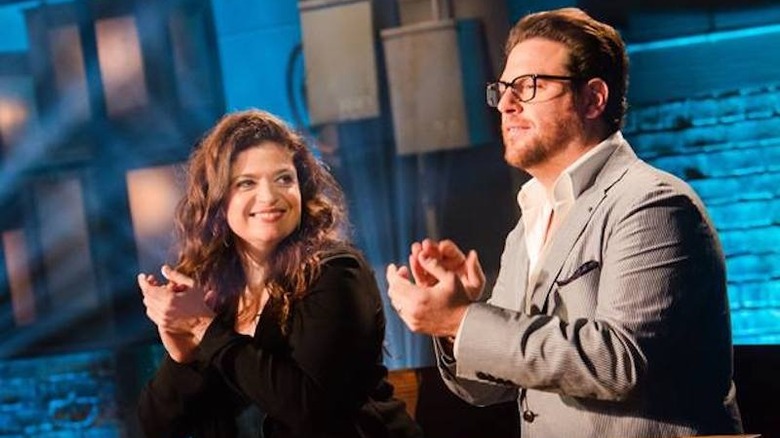 Alex Guarnaschelli and Scott Conant clapping