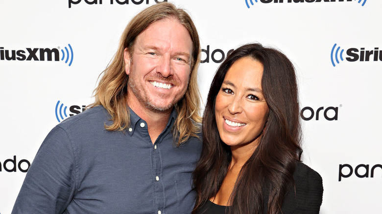 Chip and Joanna Gaines smiling for the camera