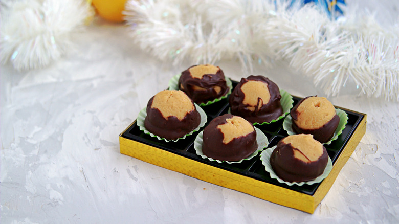 homemade buckeyes with Christmas background