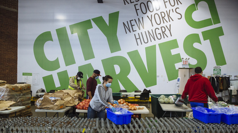 City Harvest volunteers sort food