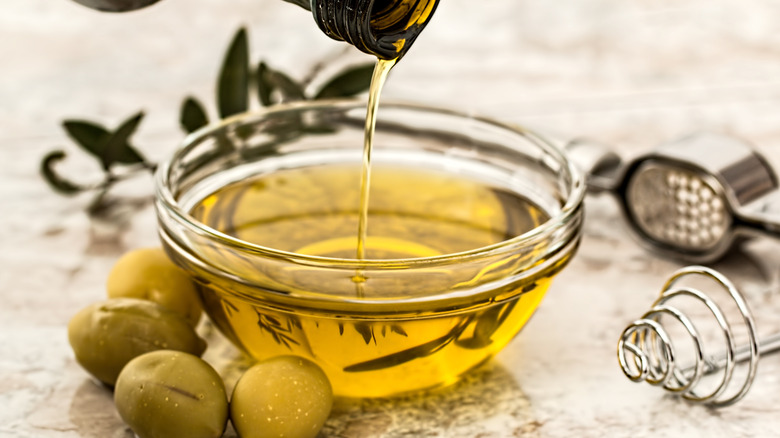 olive oil poured into bowl